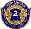 A blue and gold badge with two lions and a number

Description automatically generated