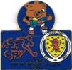 A blue and gold badge with a cartoon bear and a lion

Description automatically generated